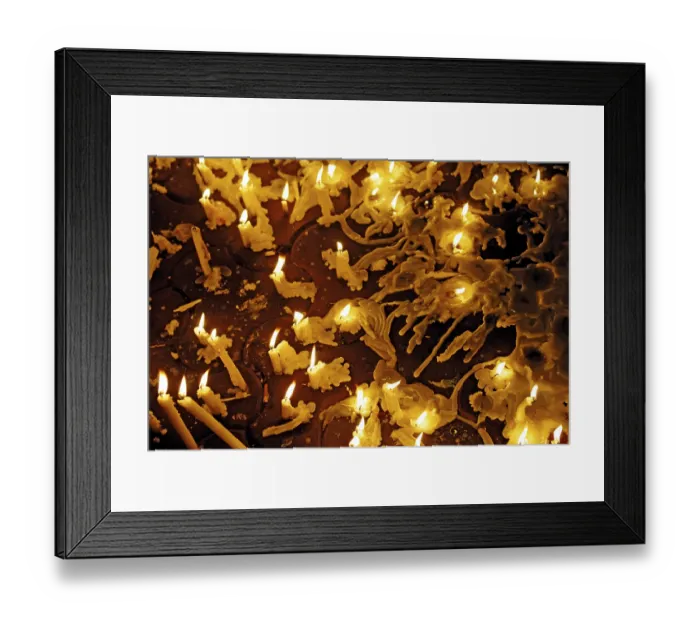 Framed Print : Lighting candles in memory of terror attack