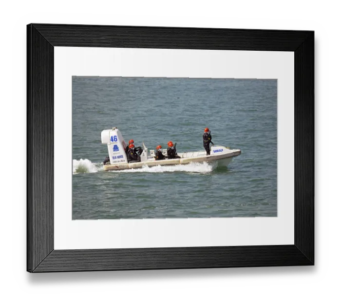 Framed Print : Commandos in speed boat rescue operation