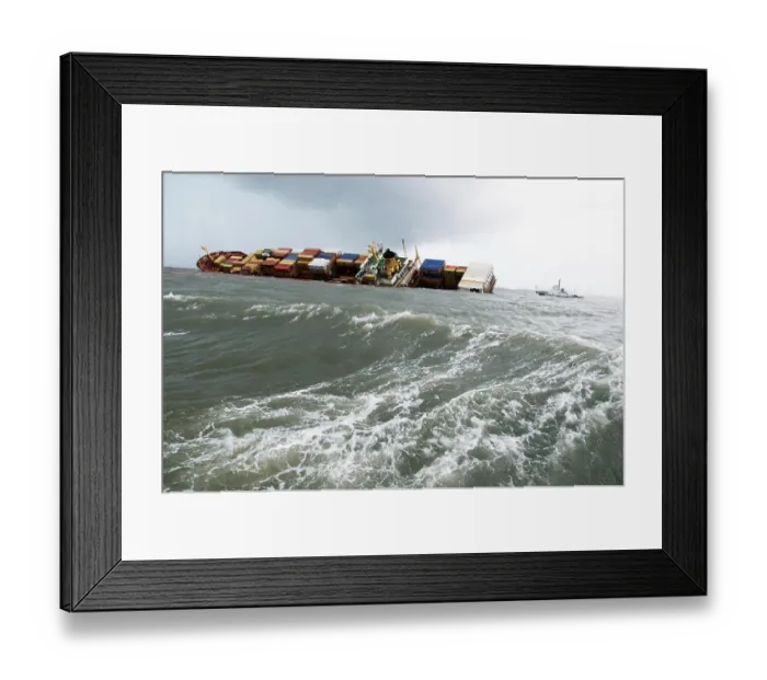 Framed Print : Container ship chitra tilted dangerously colliding in sea