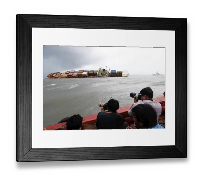 Framed Print : Container ship chitra tilted dangerously colliding in sea