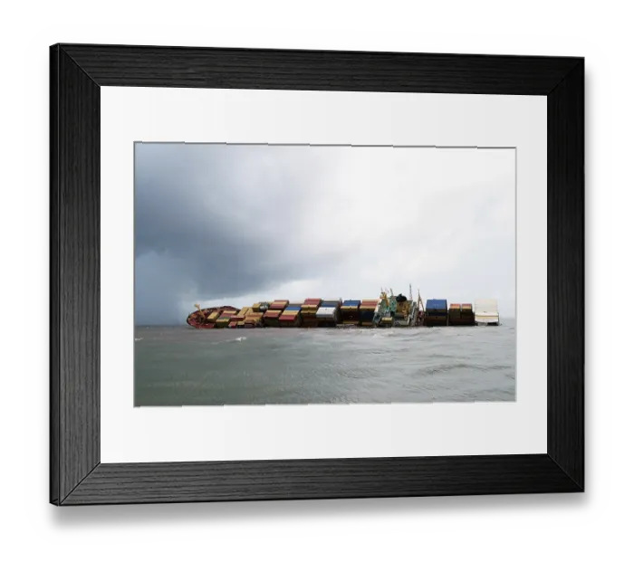 Framed Print : Container ship chitra tilted dangerously colliding in sea