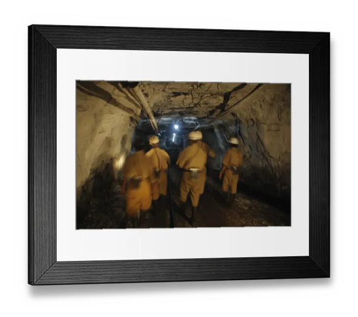 Framed Print : Miners are walking through the tunnel at the underground coal mine in jharkhand India