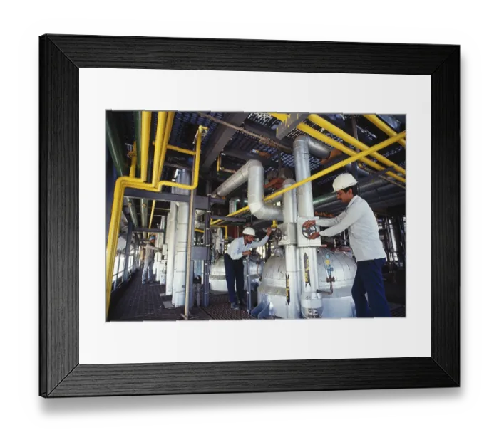 Framed Print : Men working in petro chemical plant, india