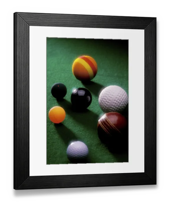 Framed Print : Golf cricket billiard snooker squash balls on green table Framed Print : Golf cricket billiard snooker squash balls on green table