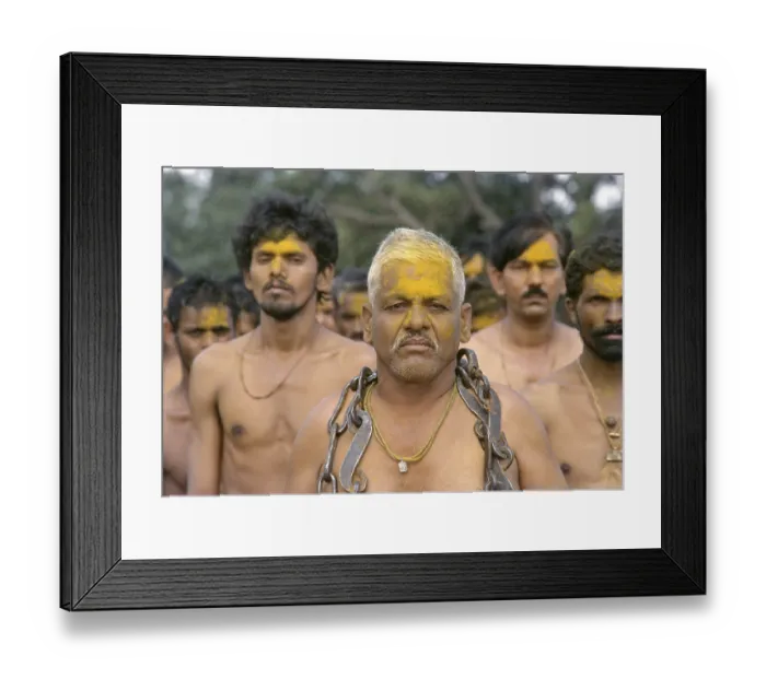 Framed Print : Devotees stripped to the waist waiting to be possessed by Khandoba stand in the river Framed Print : Devotees stripped to the waist waiting to be possessed by Khandoba stand in the river