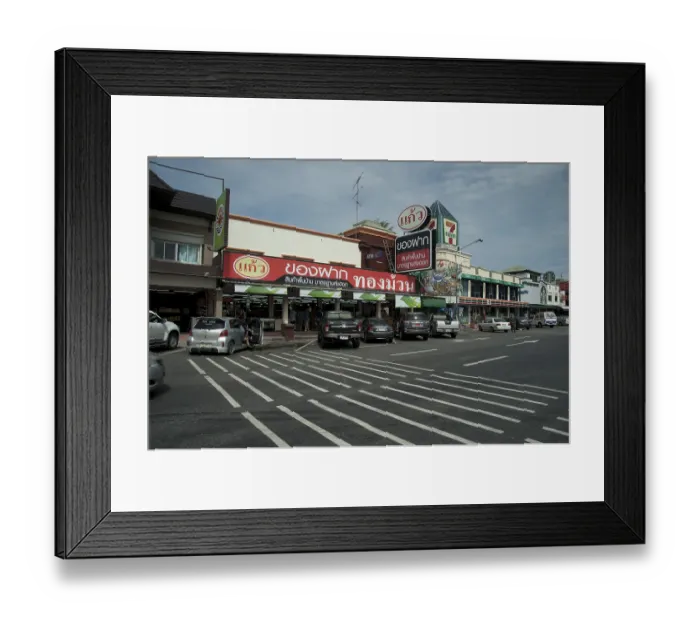 Framed Print : Cars parking outside restaurant