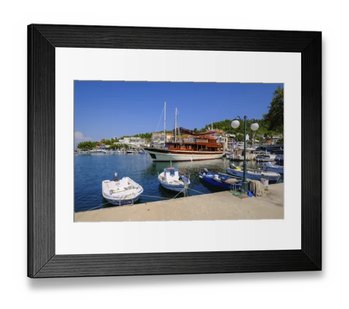 Framed Print : Limenas, Thassos, Greece - Fishing boats and an excursion boat in Limenas harbour