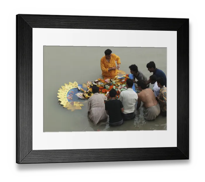 Framed Print : Durga Puja, ceremonial immersion of goddess in river Ganga