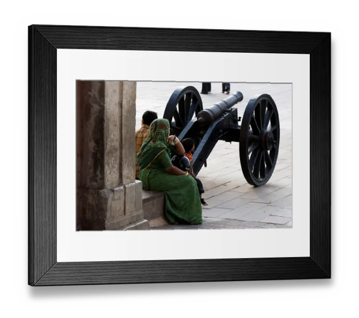 Framed Print : Tourists at cannon near main door of Amer fort known Amber fort in Amber Framed Print : Tourists at cannon near main door of Amer fort known Amber fort in Amber