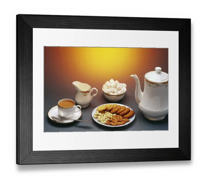Framed Print : Tea served with biscuits and dry fruits, India