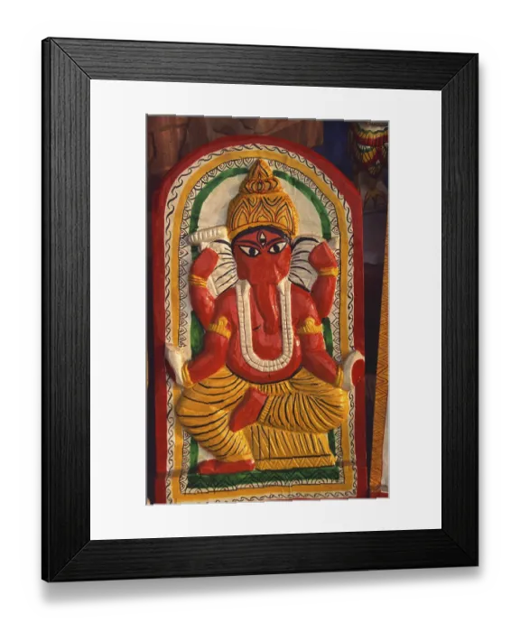 Framed Print : Wooden idol of god Ganesh, India Framed Print : Wooden idol of god Ganesh, India