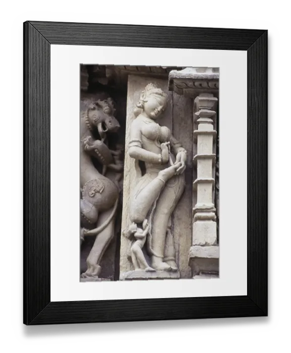 Framed Print : Stone carving on Parshvanatha Temple