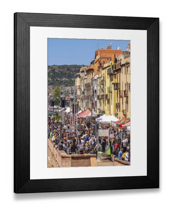 Framed Print : Sardinia, boats in the river Temo and houses on the promenade