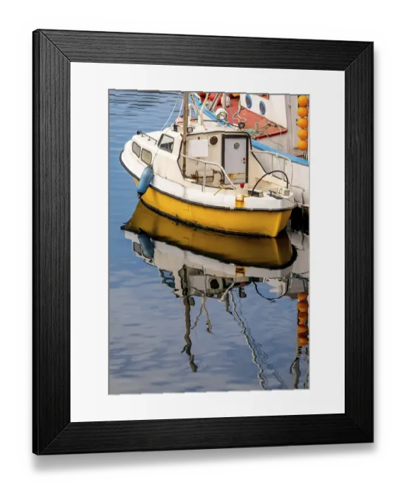 Framed Print : Fishing boat with reflection in the harbour of Honningsvag