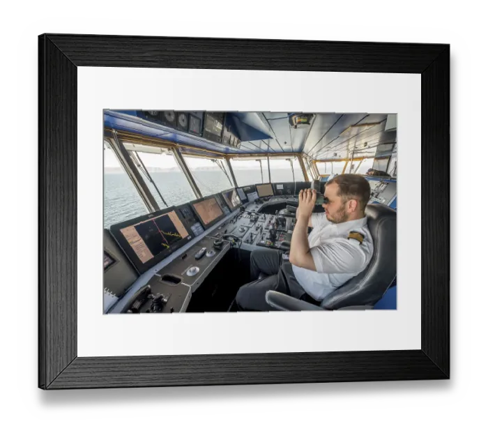 Framed Print : MS Polarlys, command bridge, officer on bridge