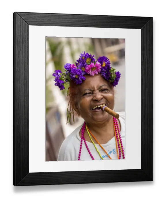 Framed Print : Old Cuban woman with flowers and cigar posing for a tip for tourists