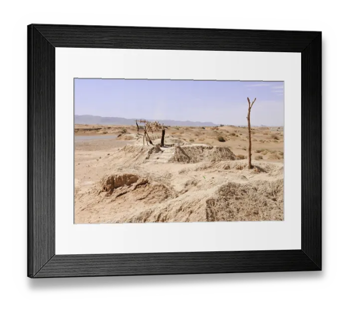 Framed Print : Well, wooden scaffolding on a sandy hill in a dry desert landscape Framed Print : Well, wooden scaffolding on a sandy hill in a dry desert landscape
