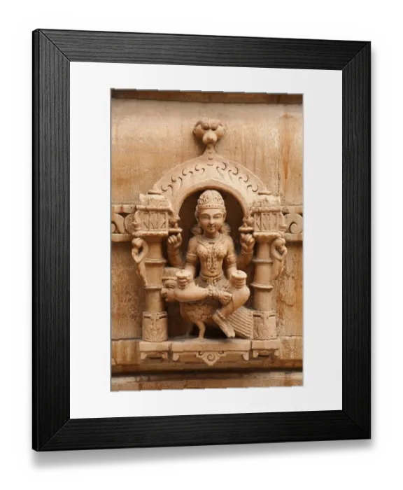 Framed Print : Sculpture of goddess chakreshwari sitting on a eagle on the wall of panchasara parasvanath jain temple