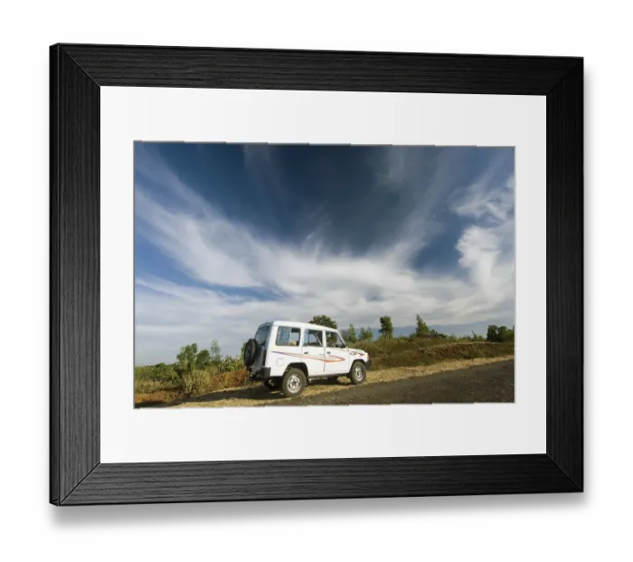 Framed Print : White sumo car under dramatic sky at Chikhaldara