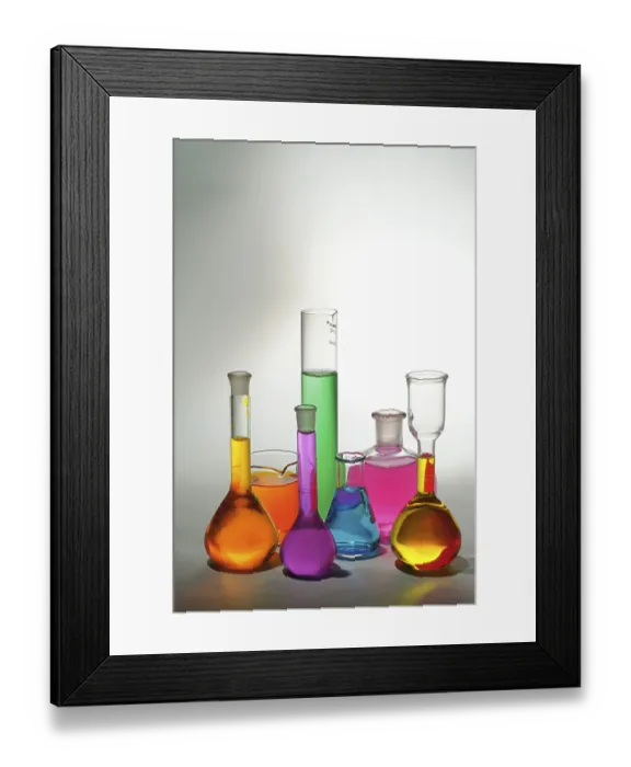 Framed Print : Concept, various colourful chemicals in beakers on white background