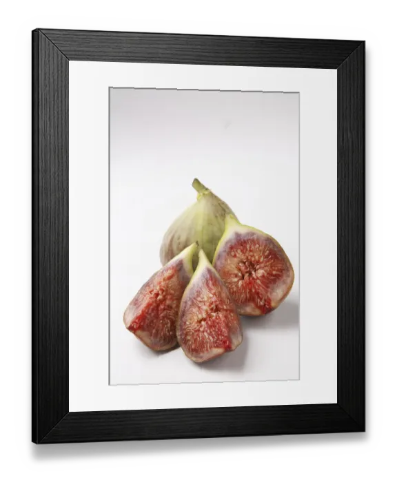 Framed Print : Fruit, Figs Ficus Carica Anjir one full and another cut in three pieces red juicy texture on white background