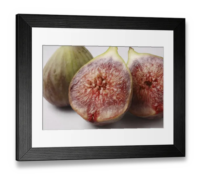 Framed Print : Fruit, Figs Ficus Carica Anjir one full and other cut in two half red juicy texture on white background Framed Print : Fruit, Figs Ficus Carica Anjir one full and other cut in two half red juicy texture on white background