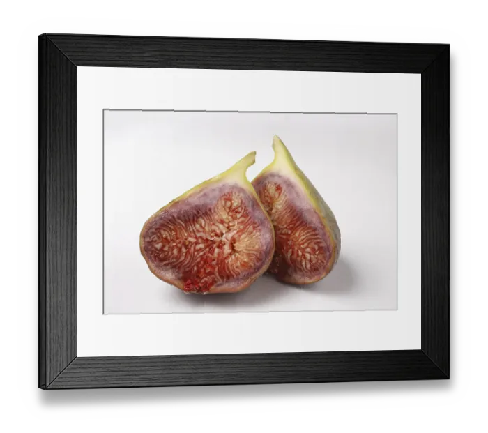 Framed Print : Fruit, one Fig Ficus Carica Anjir cut in to two pieces on white background