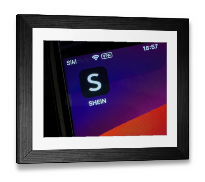 Framed Print : App symbol of Chinese online retailer SHEIN on smartphone Framed Print : App symbol of Chinese online retailer SHEIN on smartphone