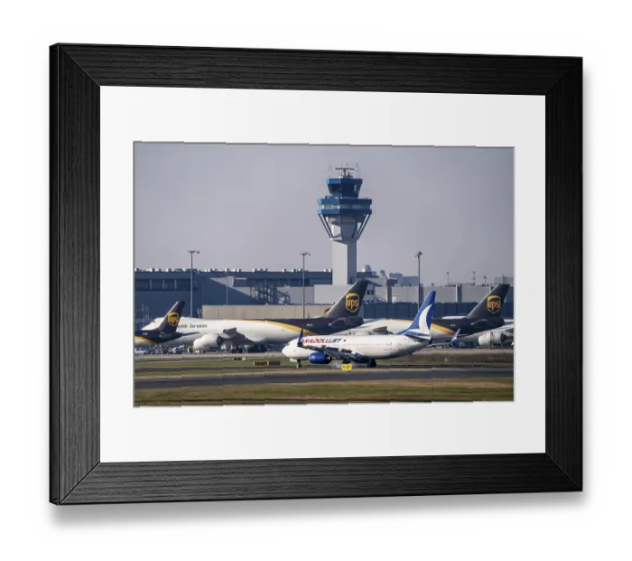 Framed Print : Anadolujet Boeing 737 lands at Cologne-Bonn Airport