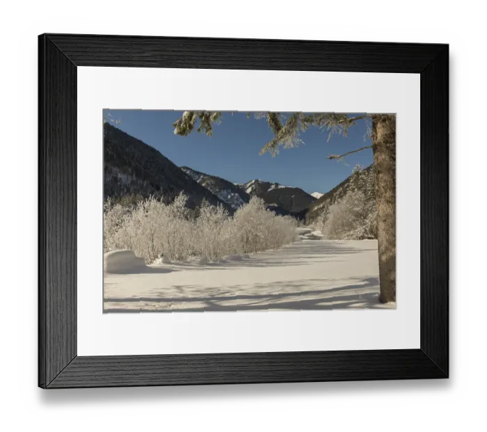 Framed Print : The Riss creek flowing through a snow covered landscape in the Eng valley