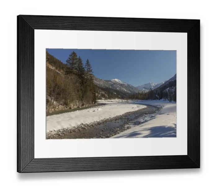 Framed Print : The Riss creek flowing through a snow covered landscape in the Eng valley