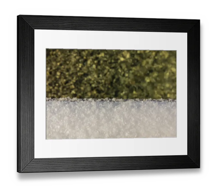 Framed Print : The Riss creek flowing through a snow covered landscape in the Eng valley