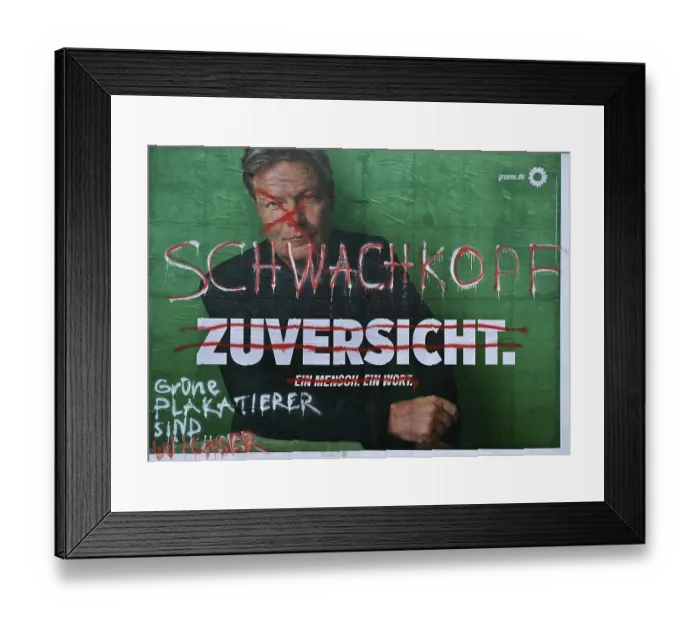 Framed Print : Denigration of a large poster for the 2025 federal election by the Greens with Robert Habeck Framed Print : Denigration of a large poster for the 2025 federal election by the Greens with Robert Habeck