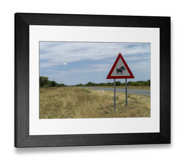 Framed Print : Traffic sign with warning of warthogs, Namibia Framed Print : Traffic sign with warning of warthogs, Namibia