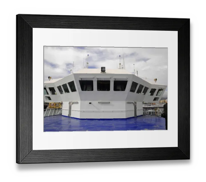 Framed Print : Ship's wheelhouse on blue ground under a changeable sky Framed Print : Ship's wheelhouse on blue ground under a changeable sky