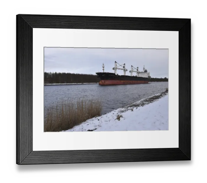 Framed Print : Cargo ship Lilly Bolten sailing in the Kiel Canal in winter