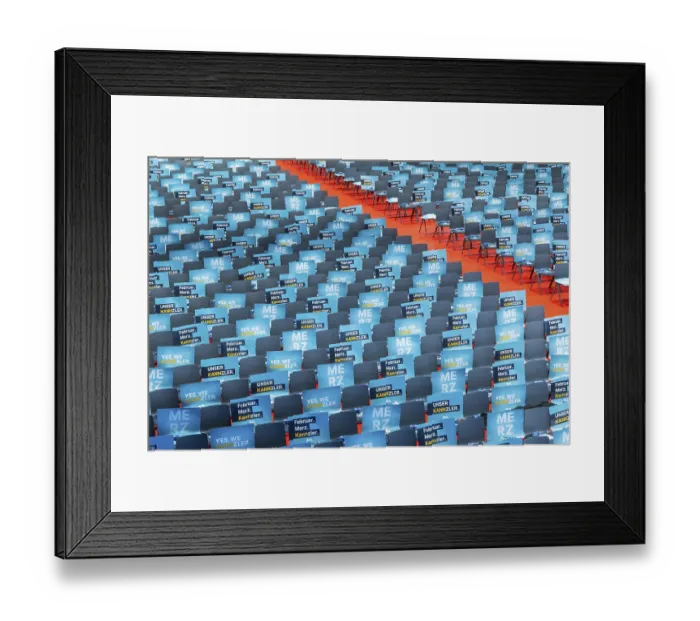 Framed Print : Assembly hall, deserted with many empty chairs and posters with the inscription UNSER KANNZLER