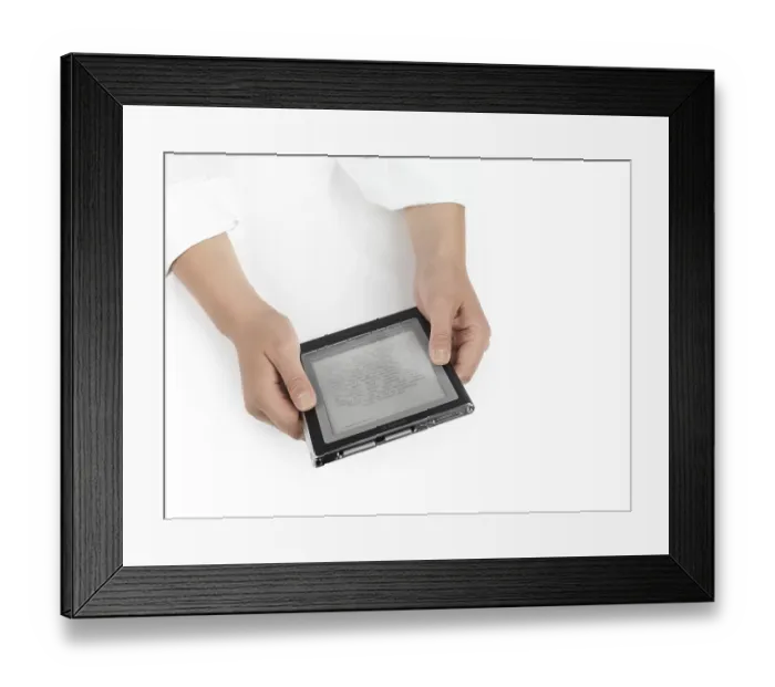 Framed Print : Woman using Sony Reader. PRS-700 Portable Reader System Framed Print : Woman using Sony Reader. PRS-700 Portable Reader System