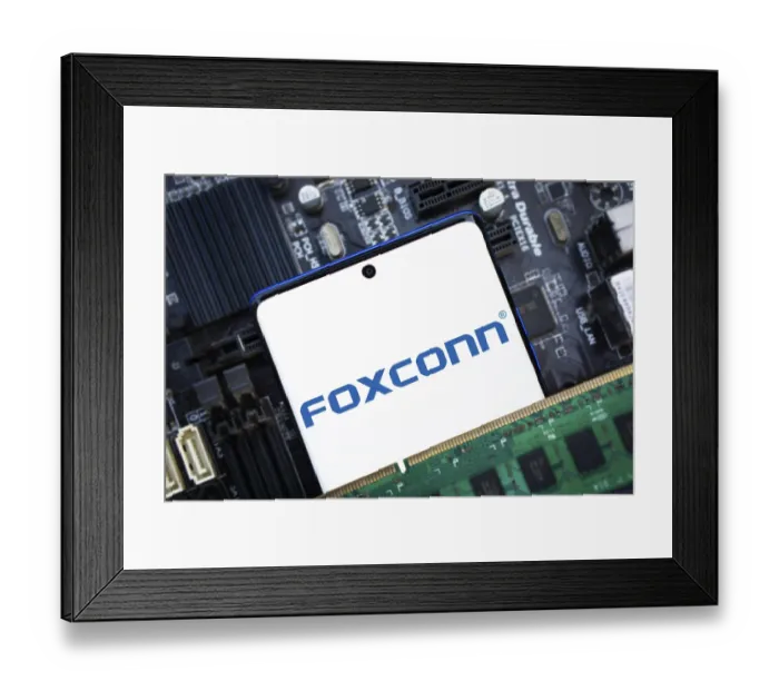 Framed Print : Foxconn company Logo on Smartphone