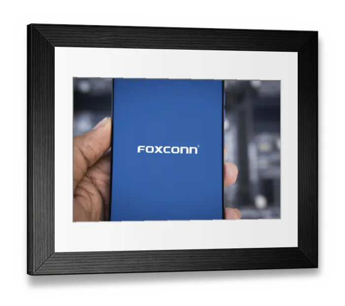 Framed Print : Foxconn company Logo on Smartphone Framed Print : Foxconn company Logo on Smartphone