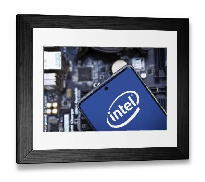 Framed Print : Intel logo is displayed on smartphone