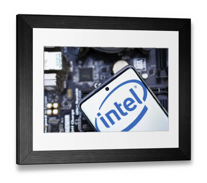 Framed Print : Intel logo is displayed on smartphone