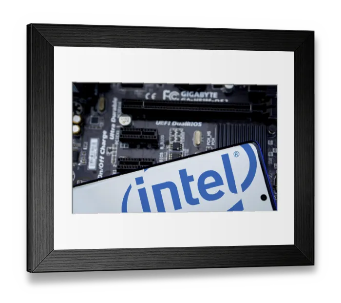 Framed Print : Intel logo is displayed on smartphone