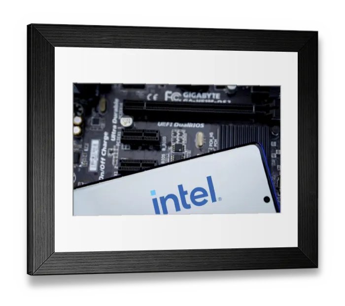Framed Print : Intel logo is displayed on smartphone