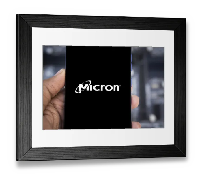 Framed Print : Micron logo is displayed on smartphone