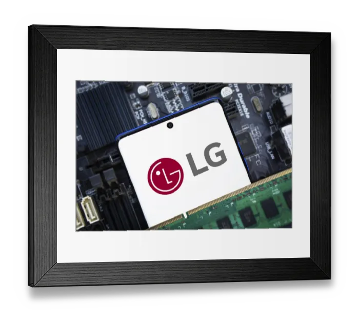 Framed Print : Smartphone with LG Electronics logo on the screen