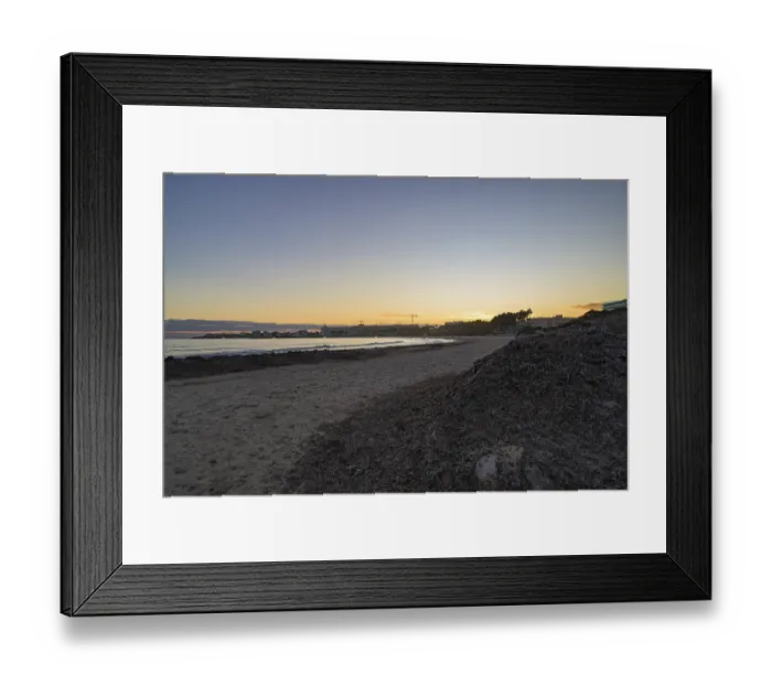Framed Print : Scenic sunset over the rocky coastline in Mallorca