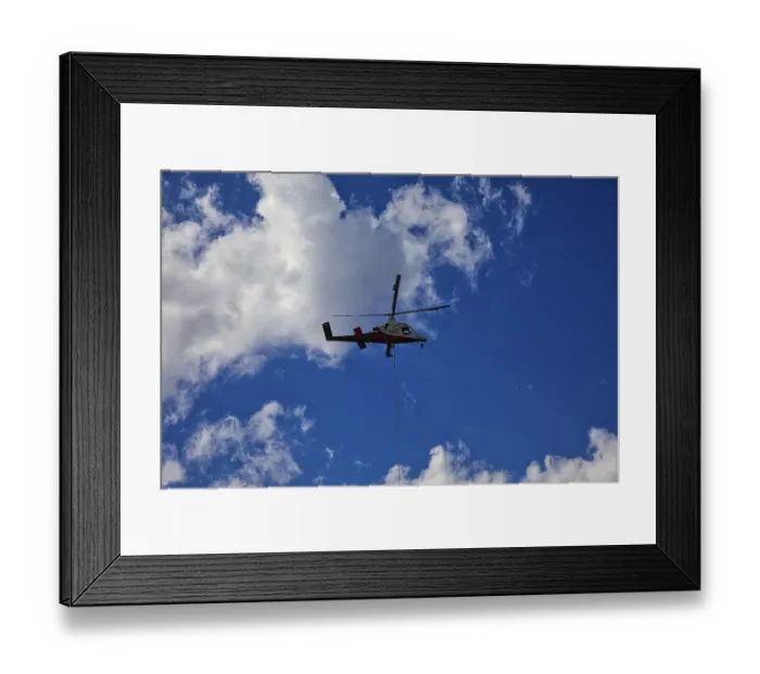 Framed Print : Small helicopter in the blue sky with few clouds Framed Print : Small helicopter in the blue sky with few clouds
