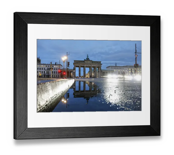 Framed Print : The Brandenburg Tor is reflected in a puddle Framed Print : The Brandenburg Tor is reflected in a puddle