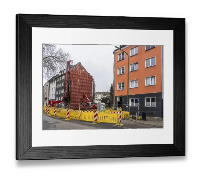 Framed Print : Building gap, construction site for a new residential building Framed Print : Building gap, construction site for a new residential building